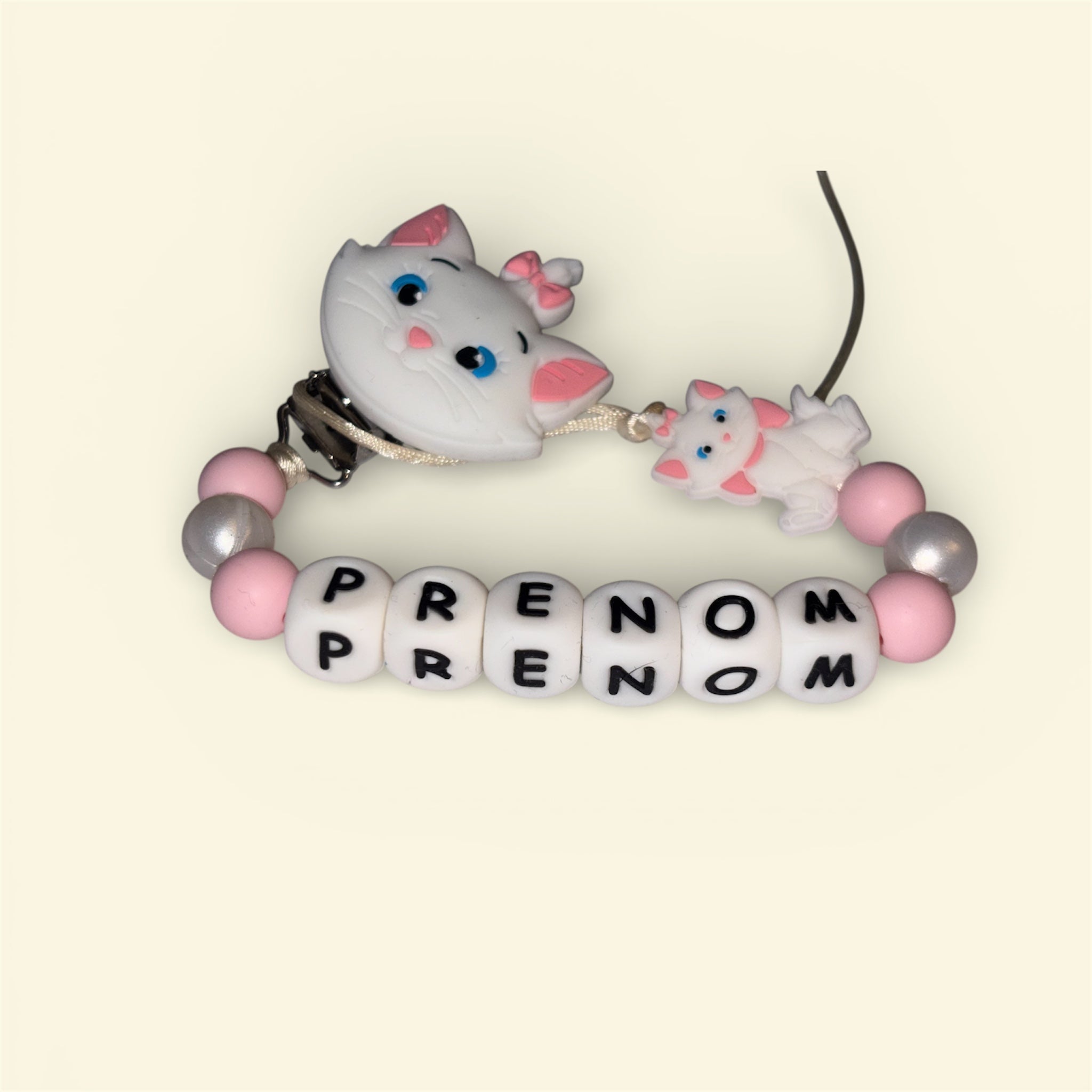 Attache tétine la petite parisienne