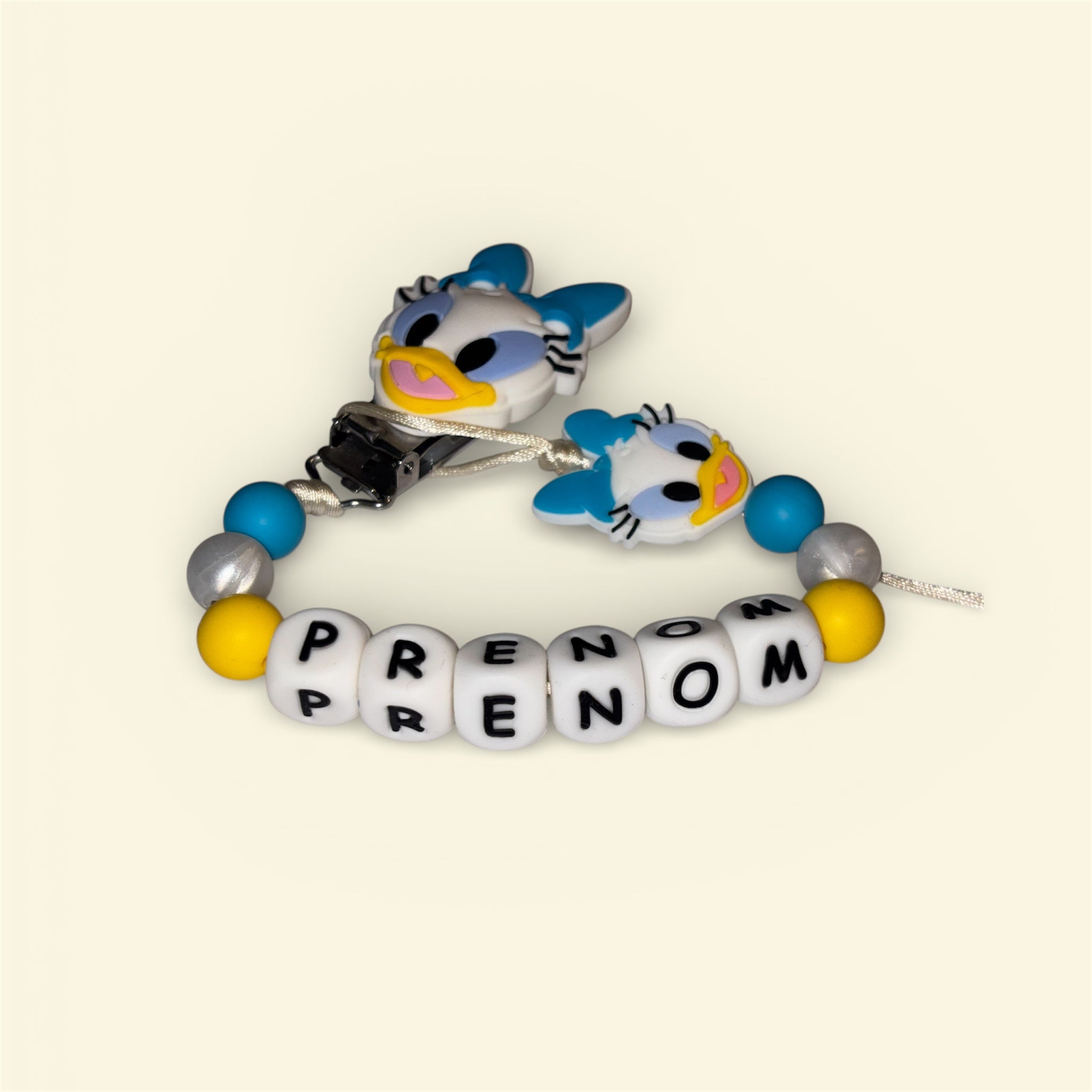 Attache tétine la coquette