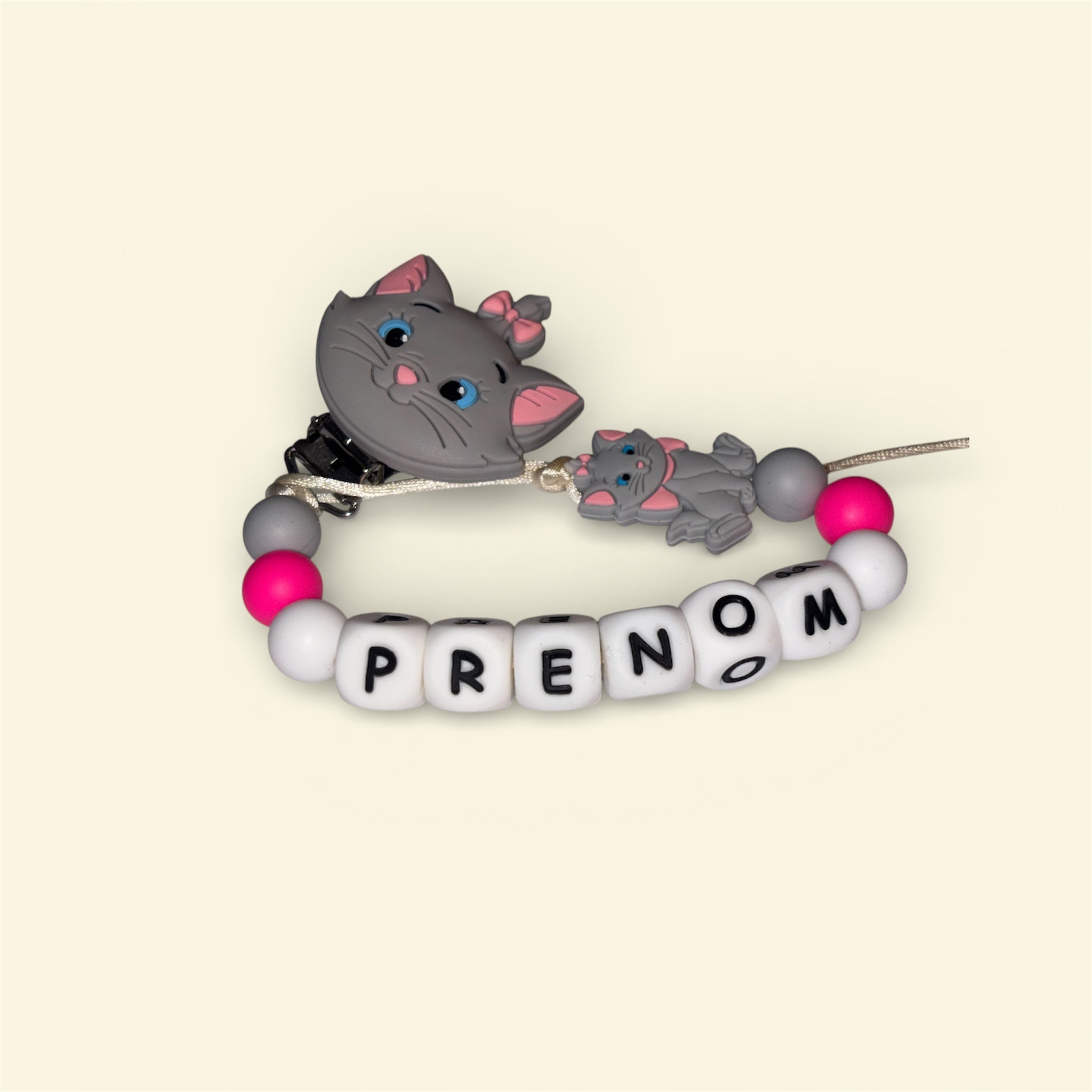 Attache tétine la petite parisienne